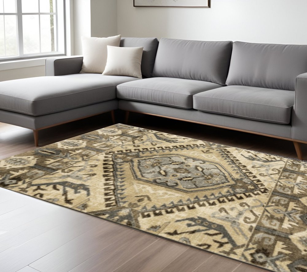5' X 8' Tan And Gold Medallion Distressed Area Rug