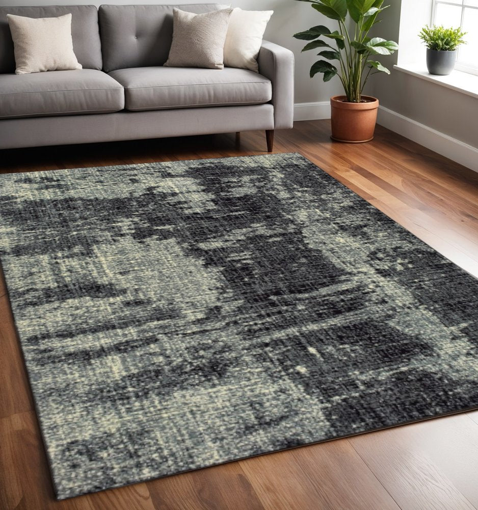 10' X 13' Black And Ivory Abstract Distressed Area Rug