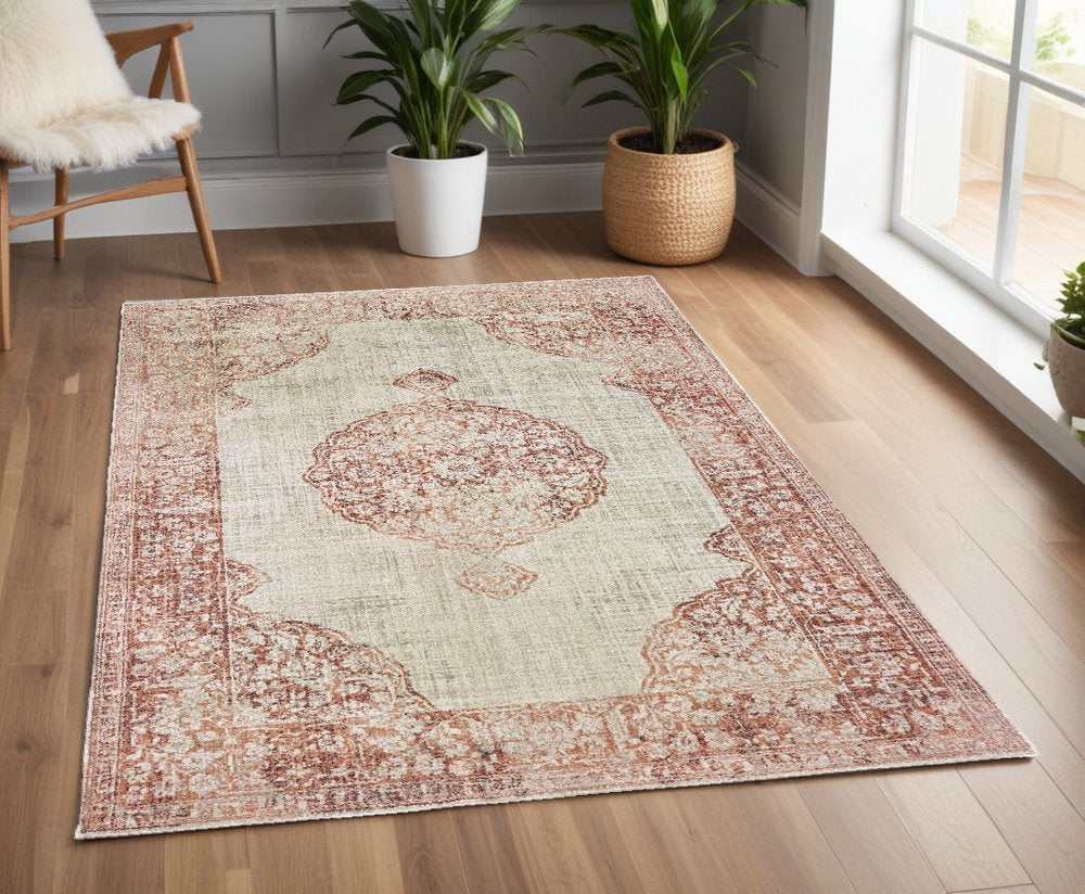 4' X 6' Ivory And Pink Medallion Area Rug