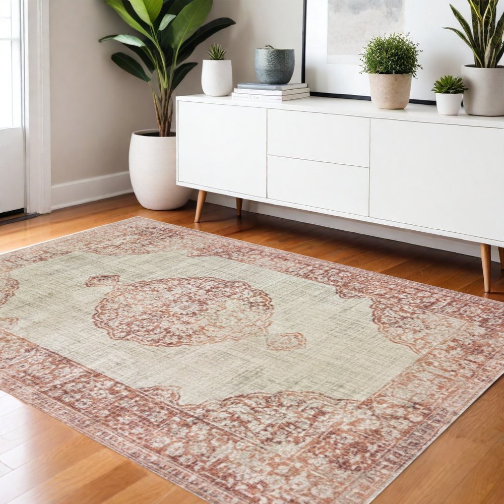 4' X 6' Ivory And Pink Medallion Area Rug