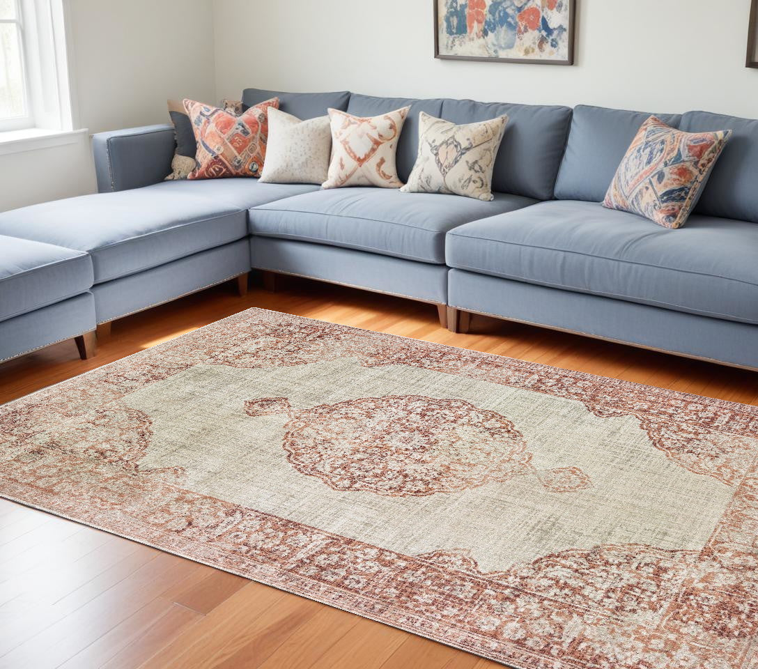 4' X 6' Ivory And Pink Medallion Area Rug