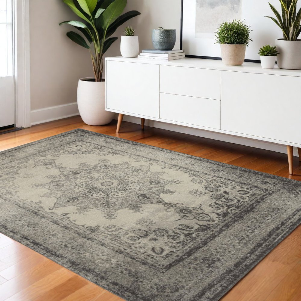 10' X 13' Ivory And Gray Pale Medallion Area Rug