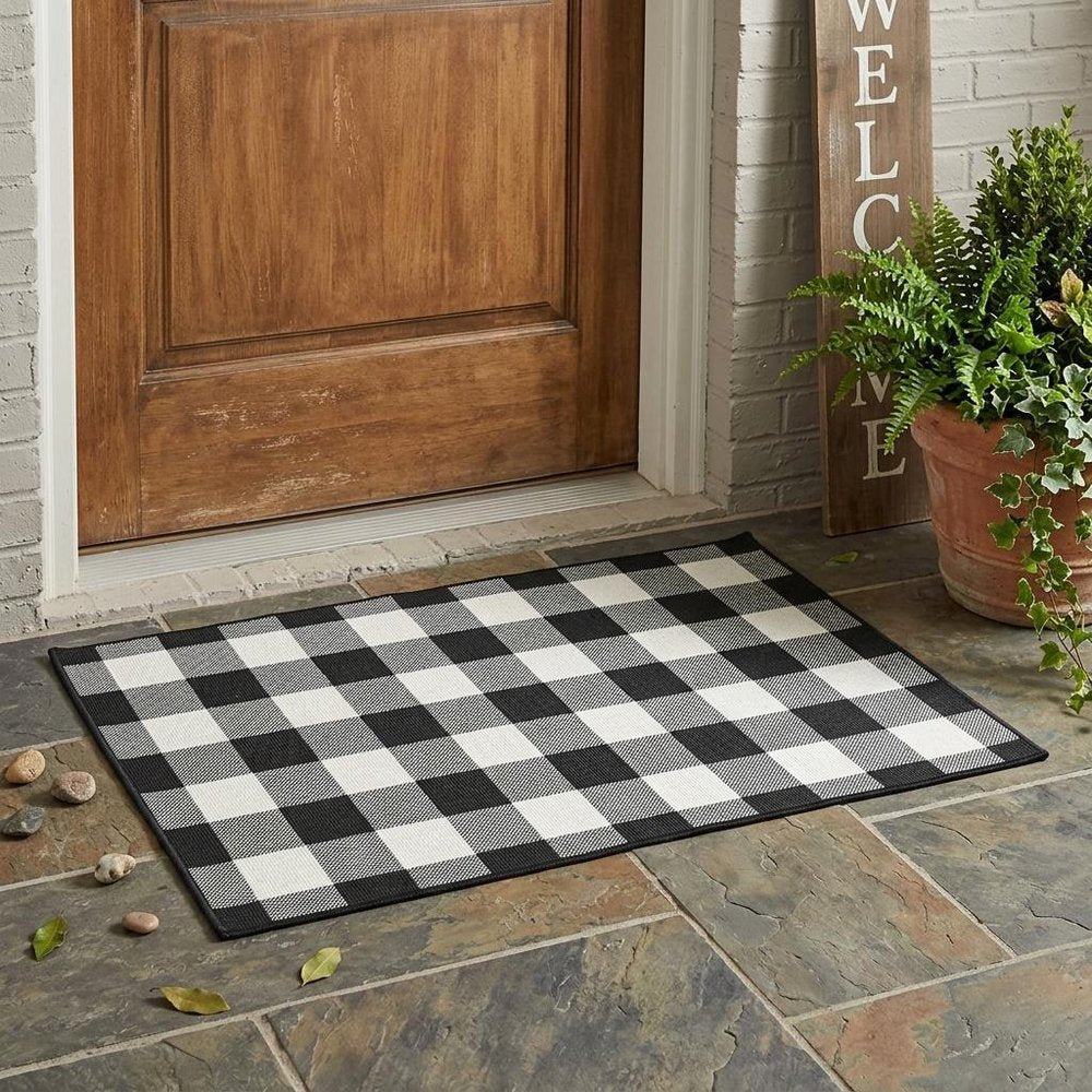 2' X 4' Black and Ivory Indoor Outdoor Area Rug