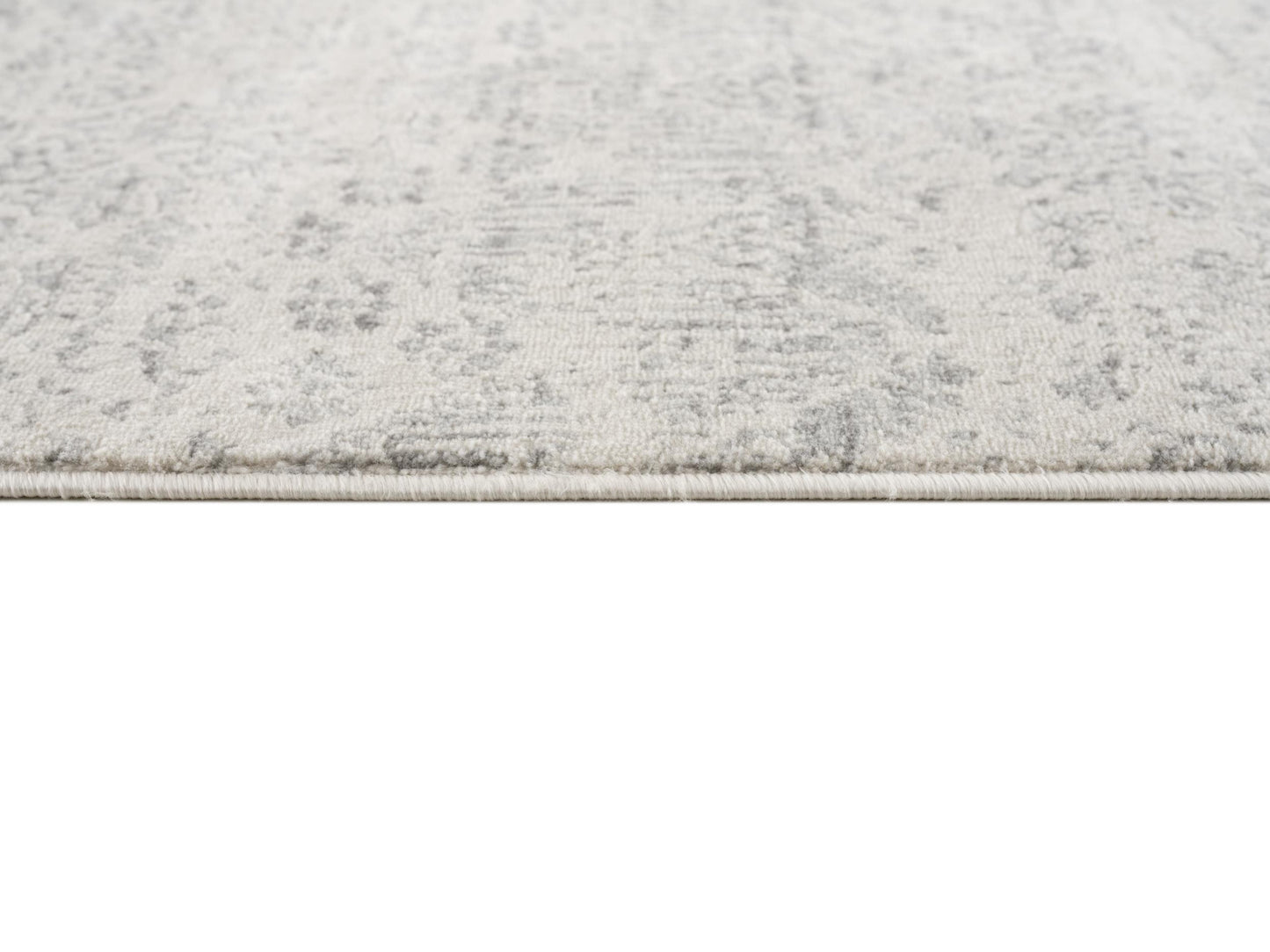 2' X 5' Ivory and Gray Ikat Power Loom Distressed Area Rug