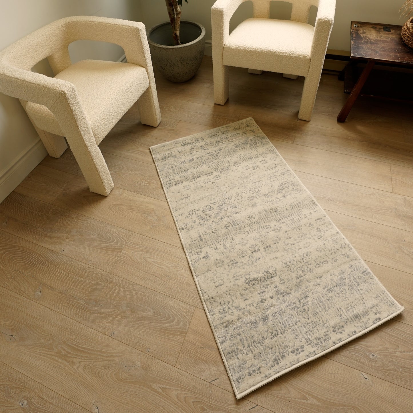 2' X 5' Ivory and Gray Ikat Power Loom Distressed Area Rug