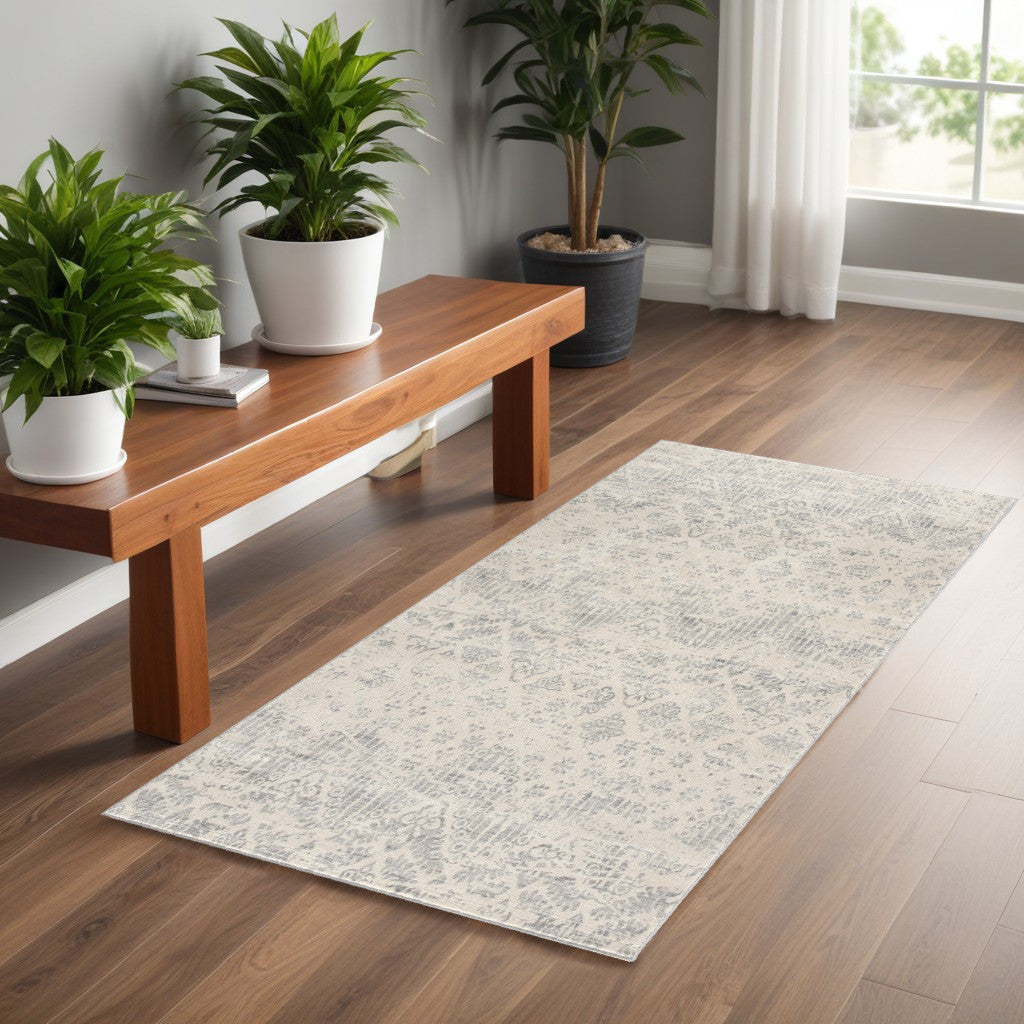2' X 5' Ivory and Gray Ikat Power Loom Distressed Area Rug
