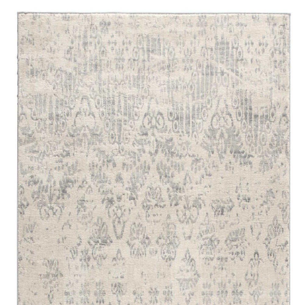 2' X 5' Ivory and Gray Ikat Power Loom Distressed Area Rug