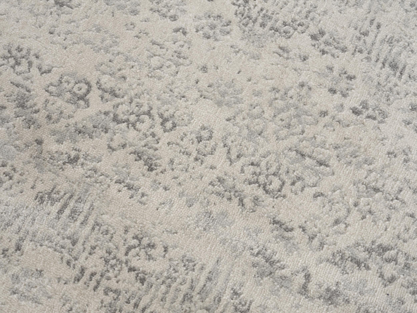 2' X 5' Ivory and Gray Ikat Power Loom Distressed Area Rug