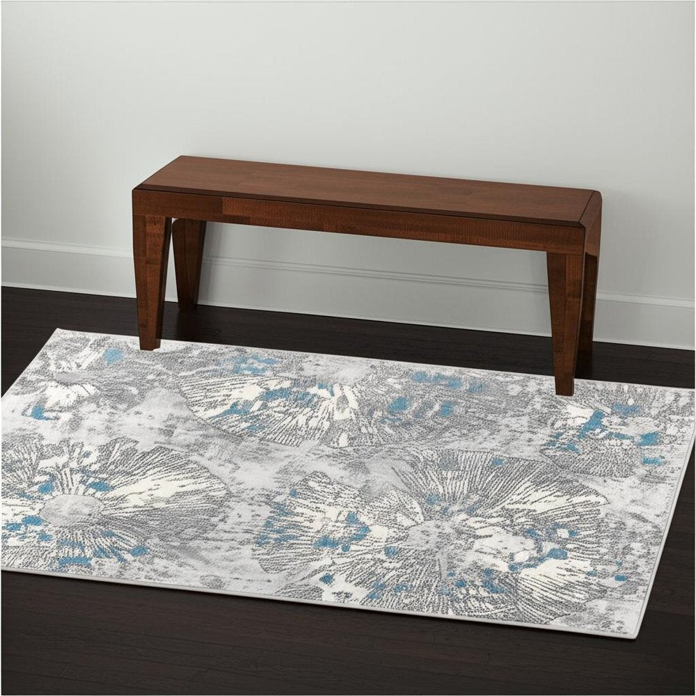 7' X 10' Blue Abstract Circular Motifs Area Rug