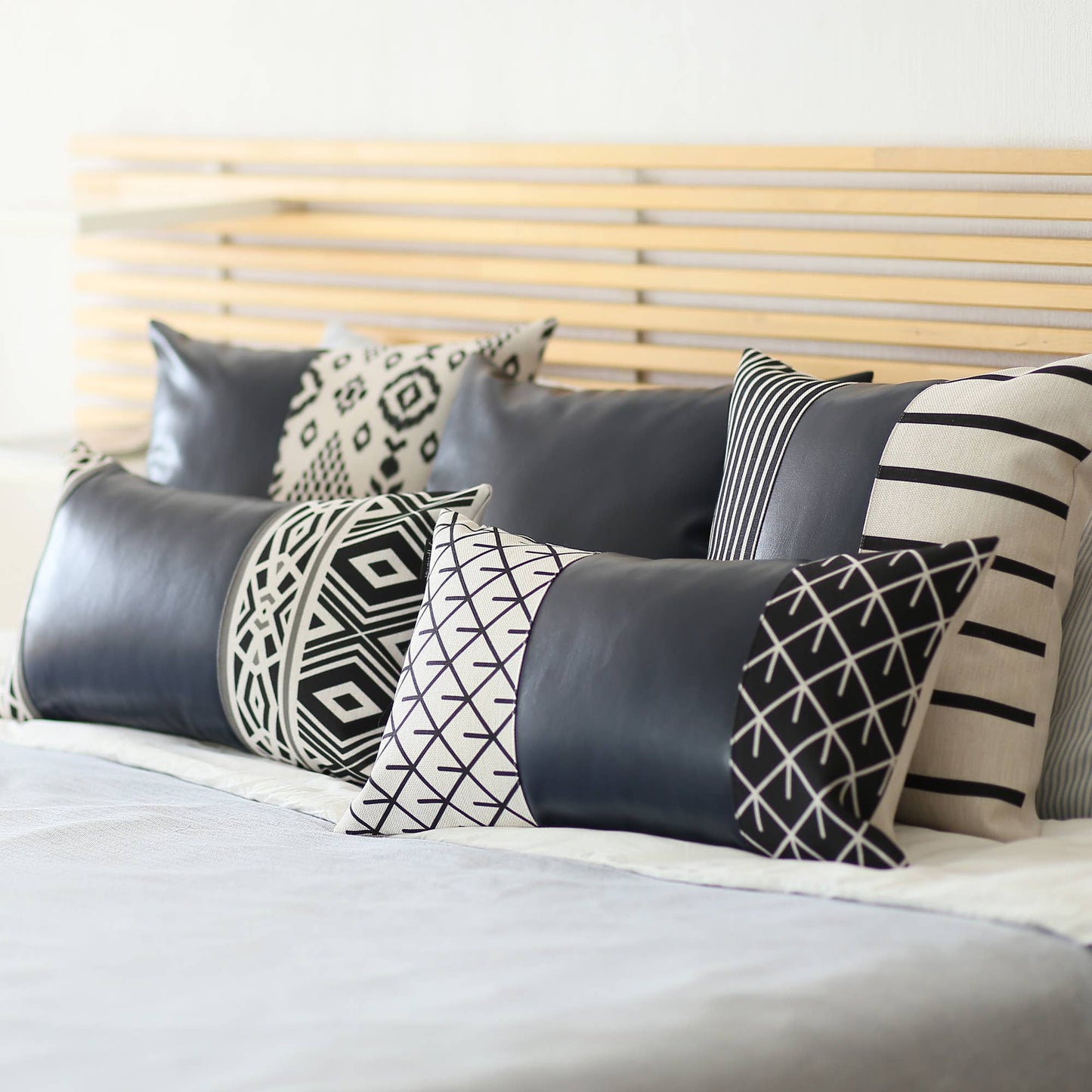 Set of Two 12" X 20" Navy Blue Diamond Fabric and Faux Leather Lumbar Throw Pillows