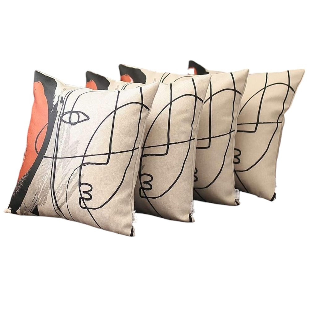 Set of Four 18" Ivory Black and Red Abstract Face Fabric Throw Pillows
