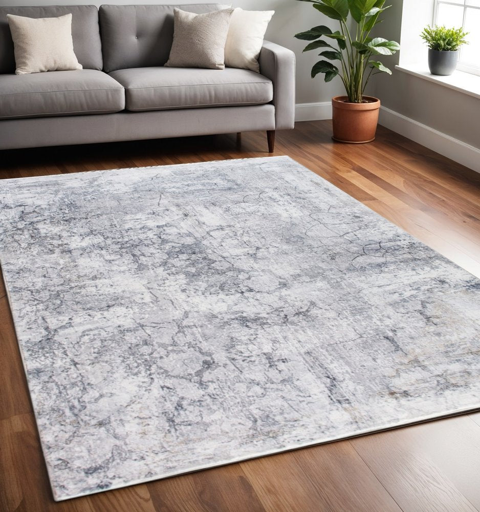 5' X 8' Gray And Ivory Abstract Area Rug