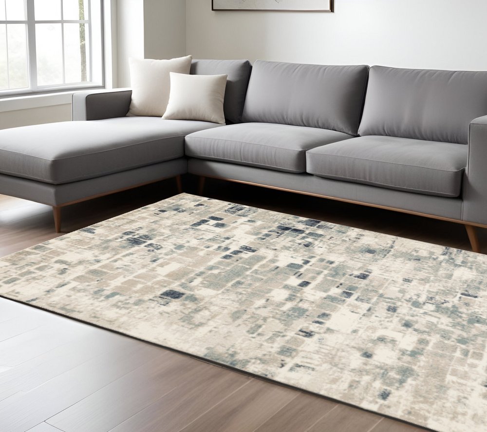 8' X 11' Blue and Beige Abstract Area Rug