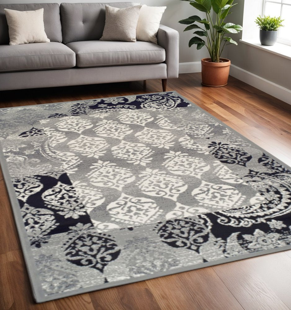 5' X 8' Black And Gray Damask Distressed Area Rug