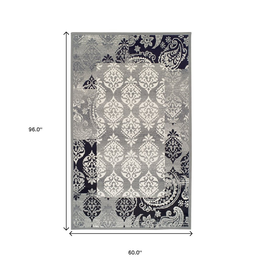5' X 8' Black And Gray Damask Distressed Area Rug