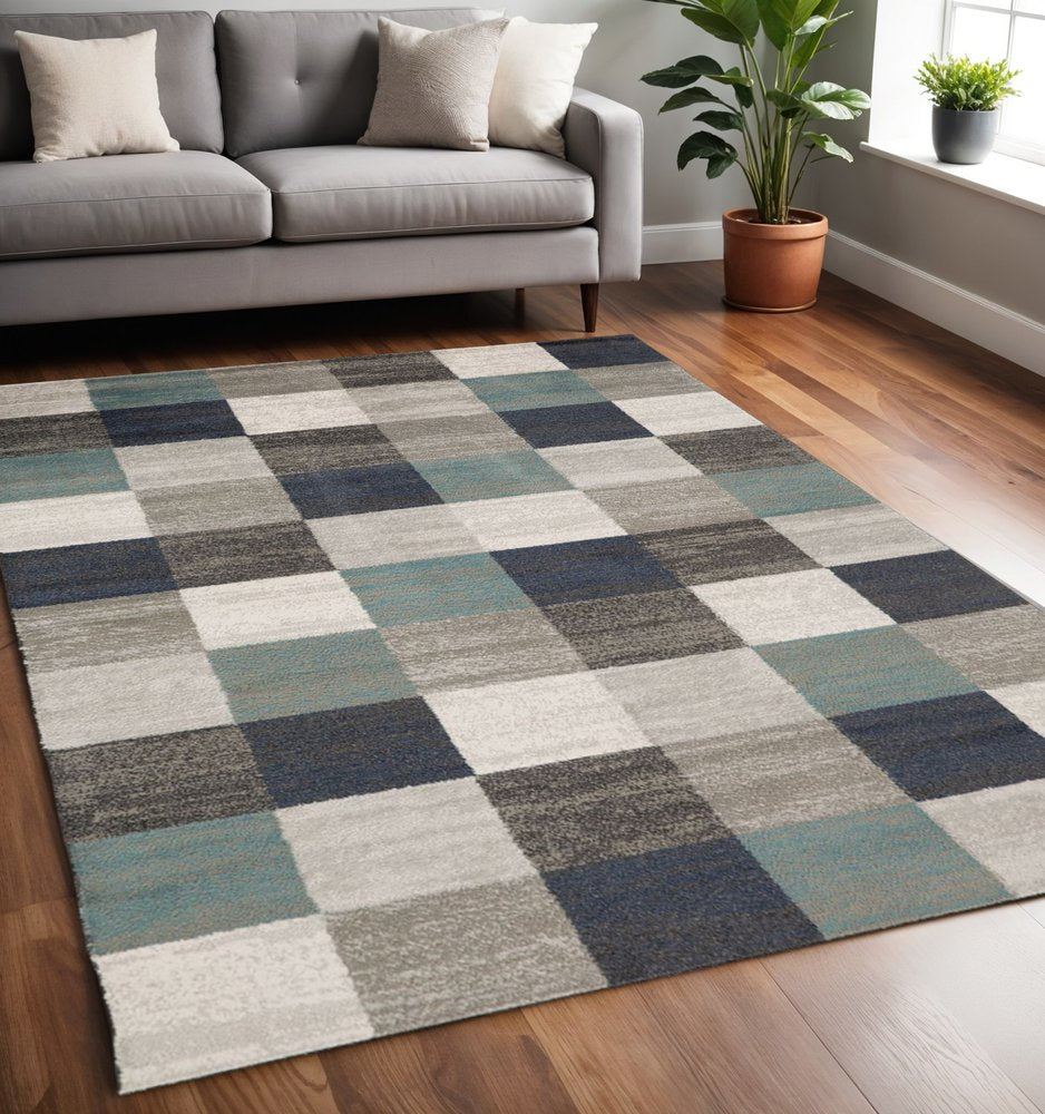 5' X 8' Teal Ivory And Gray Geometric Area Rug