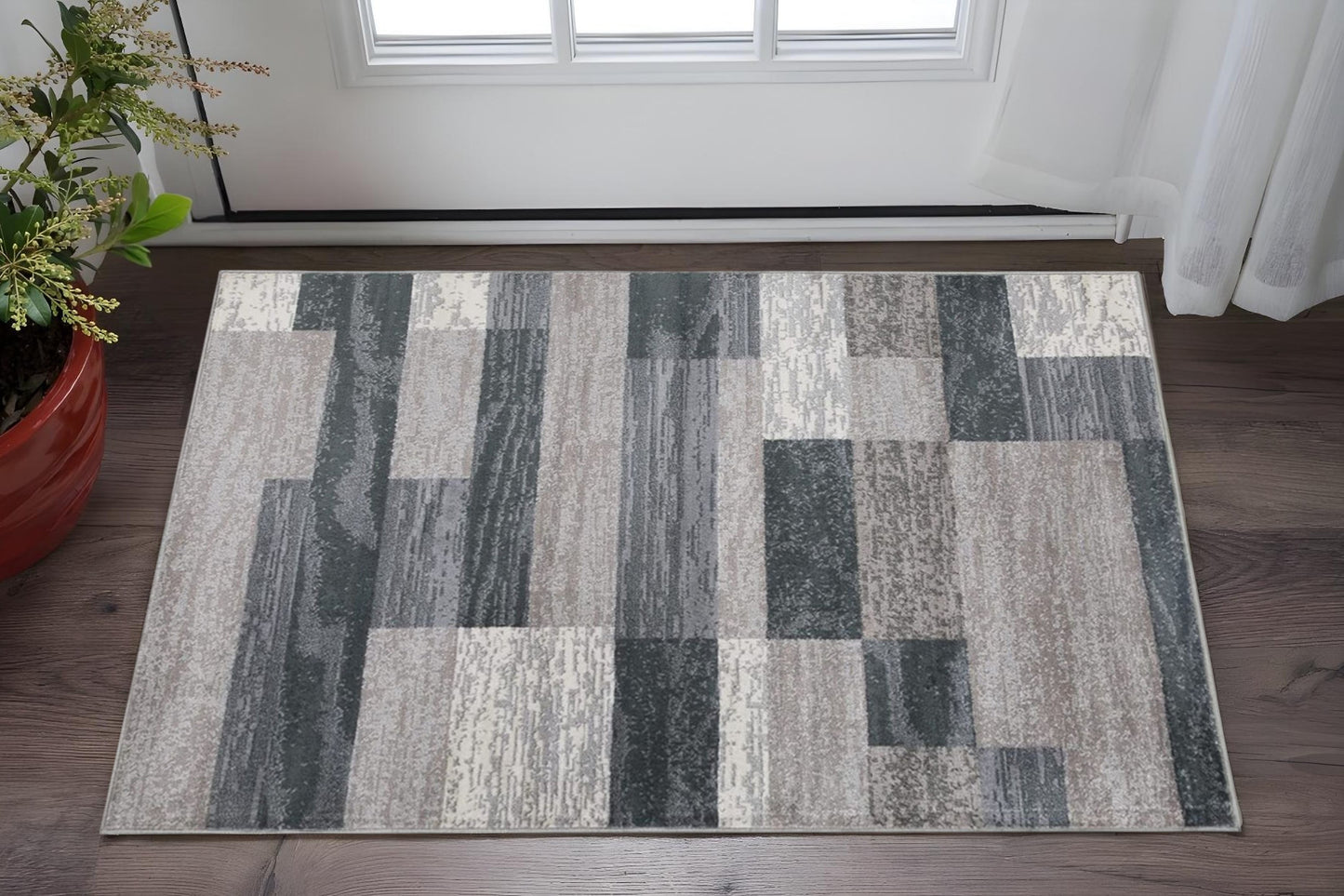 2' X 3' Blue And Taupe Patchwork Distressed Area Rug