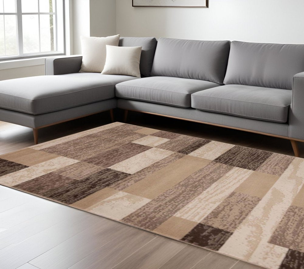7' X 9' Beige And Brown Patchwork Area Rug
