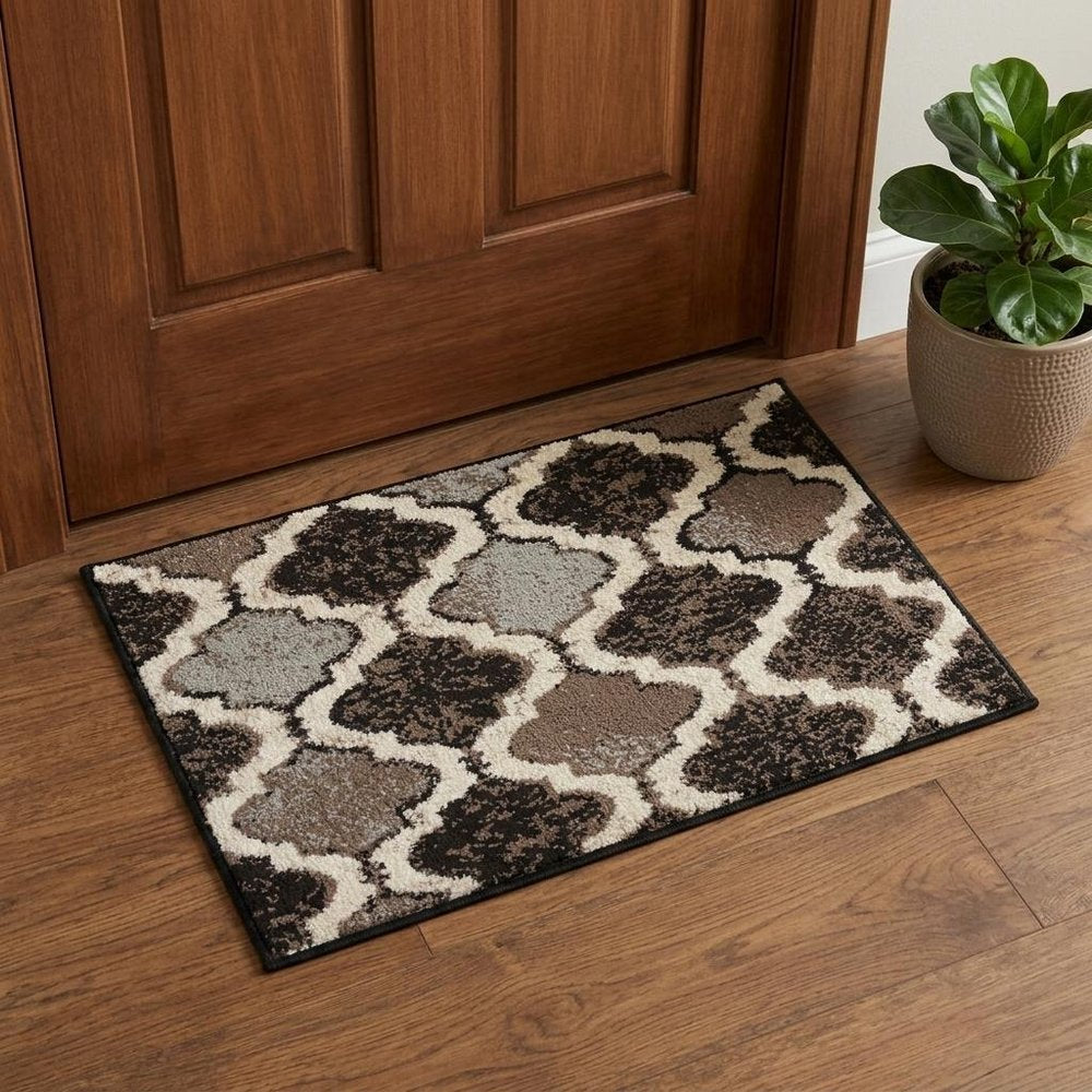 2' X 3' Brown Black And Ivory Quatrefoil Distressed Area Rug
