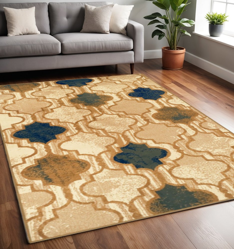 5' X 8' Cream Brown And Teal Quatrefoil Distressed Area Rug