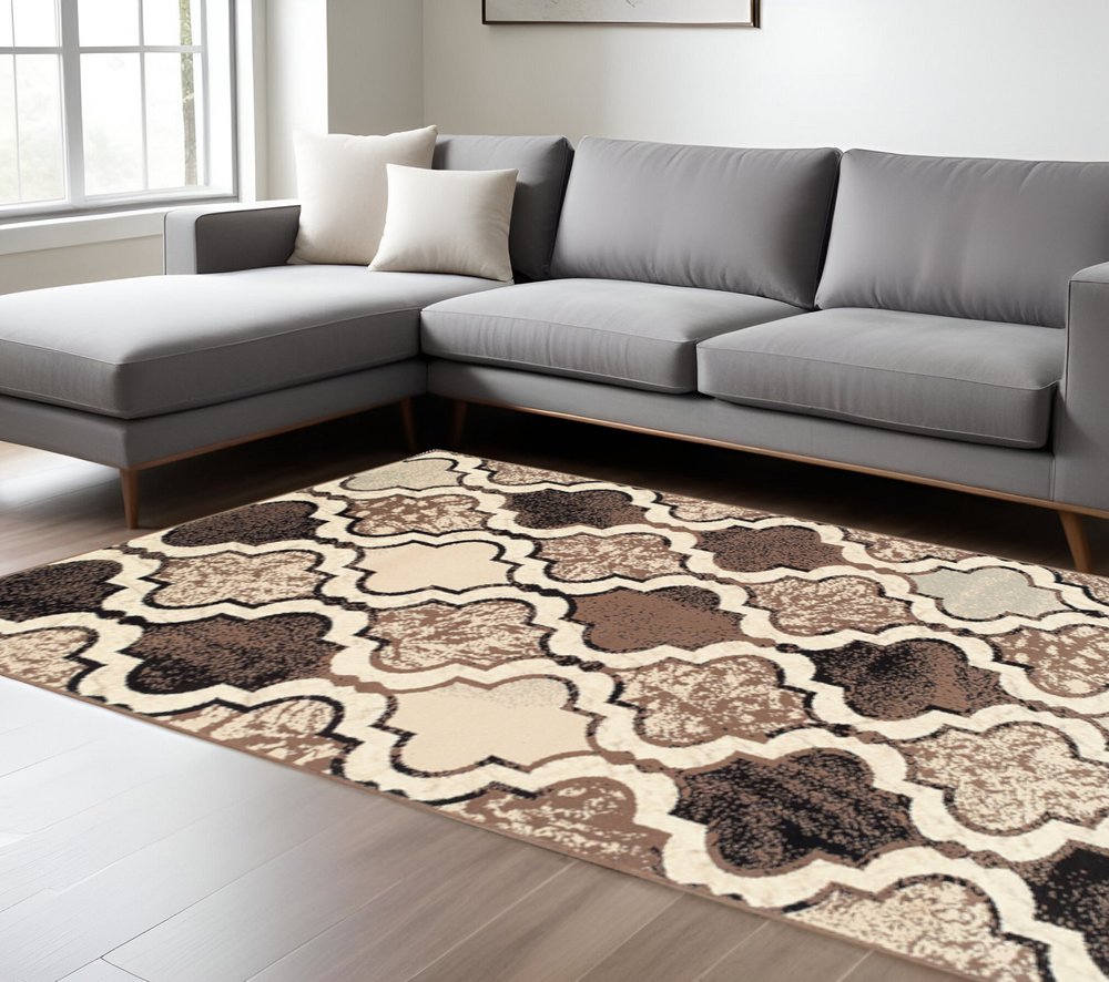 9' X 12' Ivory Brown And Black Quatrefoil Distressed Area Rug