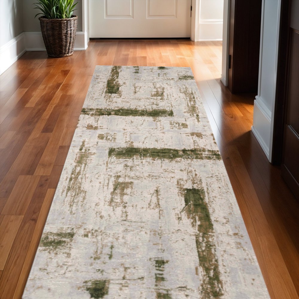 10' Green and Ivory Abstract Power Loom Distressed Runner Rug