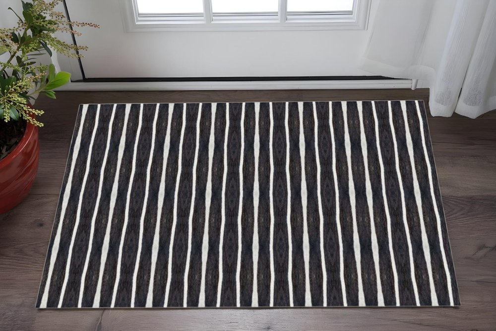 2' X 4' Black And White Modern Stripe Printed Vinyl Area Rug with UV Protection