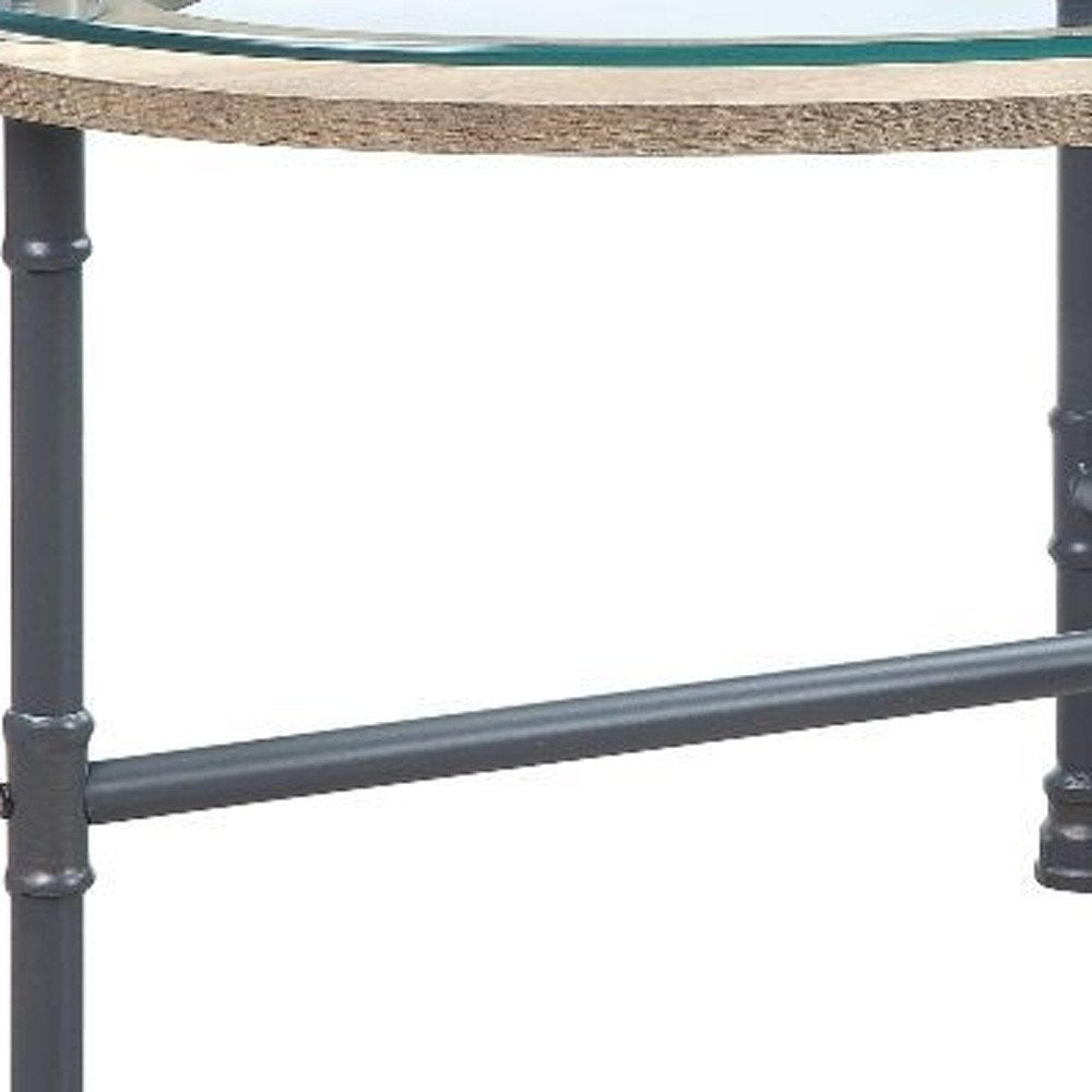 47" Clear and Gray Glass And Metal Oval Sled Coffee Table