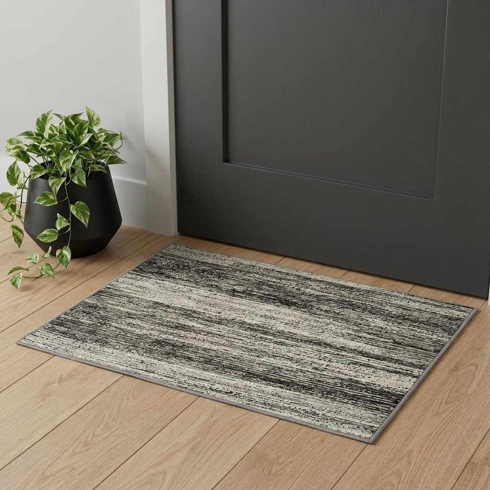 2' X 3' Gray and Ivory Abstract Power Loom Area Rug