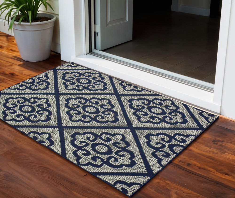 2' X 4' Blue and Ivory Geometric Stain Resistant Indoor Outdoor Area Rug