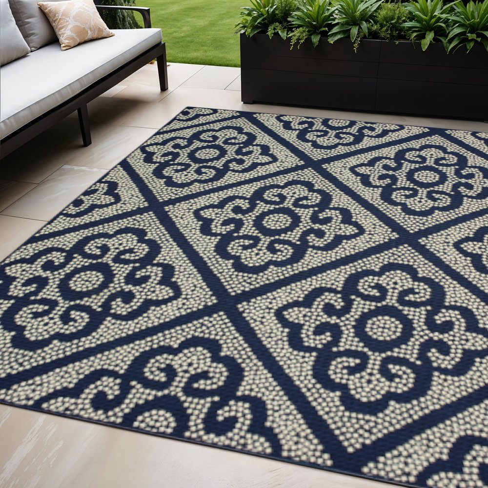 5' X 8' Blue and Ivory Geometric Stain Resistant Indoor Outdoor Area Rug