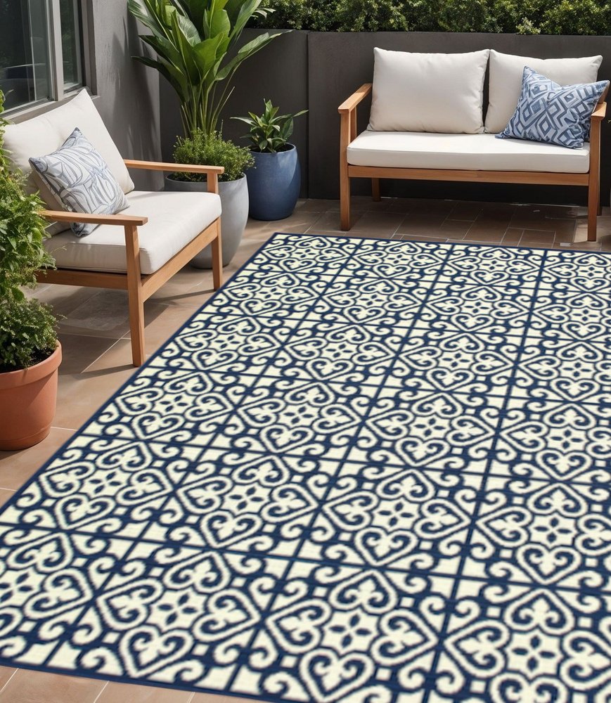 5' X 8' Ivory and Blue Geometric Stain Resistant Indoor Outdoor Area Rug