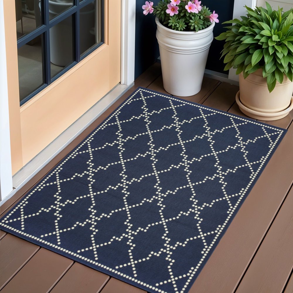 2' X 4' Blue and Ivory Geometric Stain Resistant Indoor Outdoor Area Rug