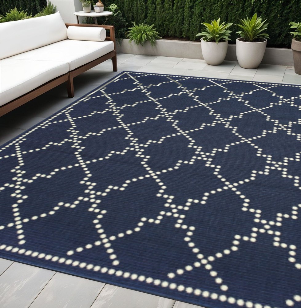 5' X 8' Blue and Ivory Geometric Stain Resistant Indoor Outdoor Area Rug