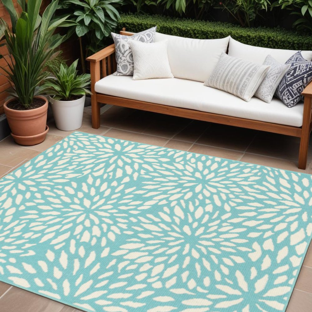 7' x 10' Blue and Ivory Floral Stain Resistant Indoor Outdoor Area Rug