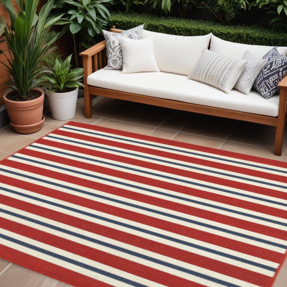 7' X 10' Red and Ivory Geometric Stain Resistant Indoor Outdoor Area Rug