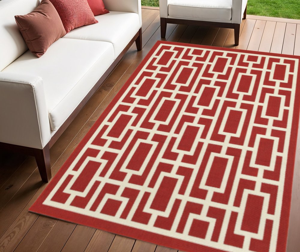 4' X 6' Red and Ivory Geometric Stain Resistant Indoor Outdoor Area Rug
