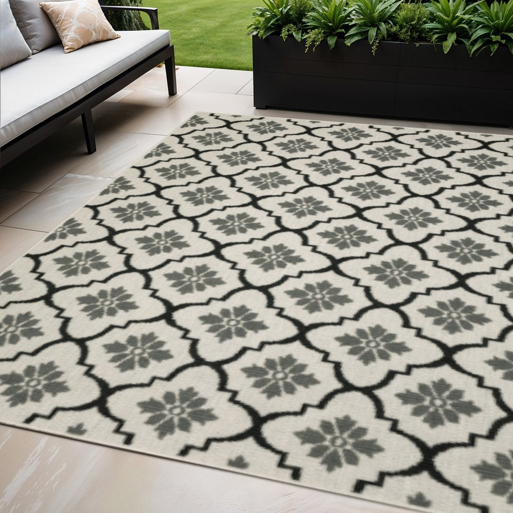 5' X 7' Beige and Black Geometric Stain Resistant Indoor Outdoor Area Rug