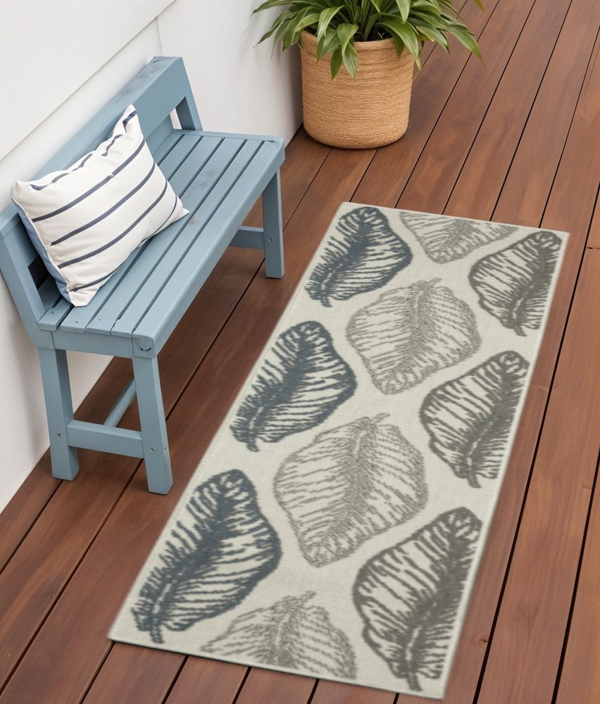 2' X 7' Beige Floral Stain Resistant Indoor Outdoor Area Rug