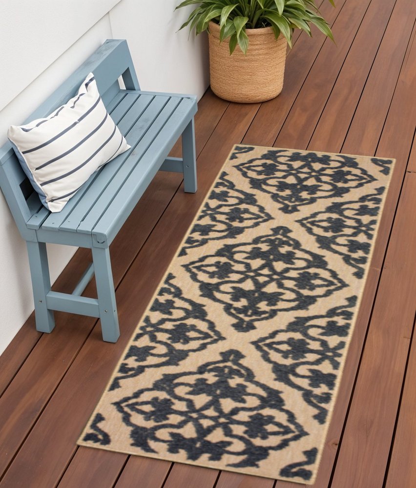 2' X 8' Beige and Black Oriental Stain Resistant Indoor Outdoor Area Rug