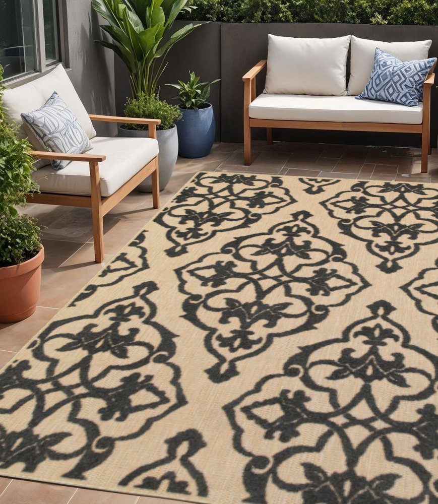 5' X 8' Beige and Black Medallion Stain Resistant Indoor Outdoor Area Rug