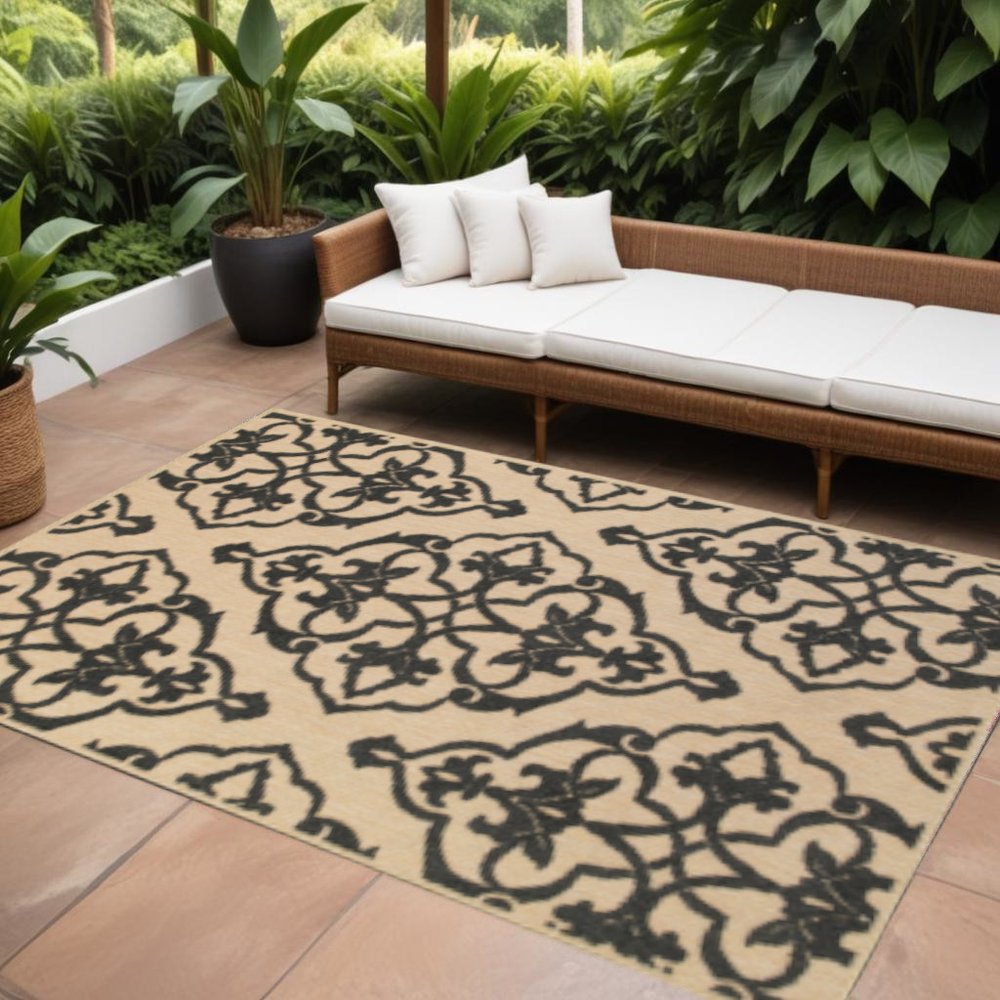 7' X 10' Beige and Black Oriental Stain Resistant Indoor Outdoor Area Rug
