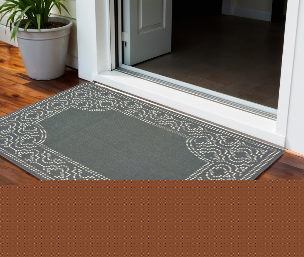 2' X 4' Gray and Ivory Stain Resistant Indoor Outdoor Area Rug