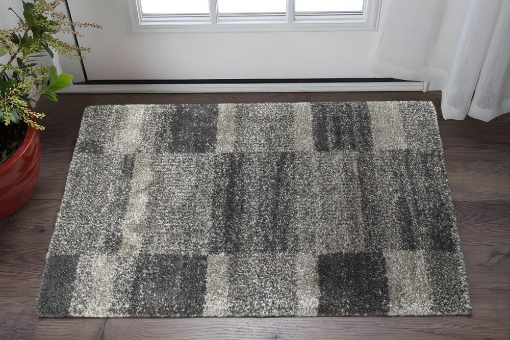 2' X 3' Charcoal Silver And Grey Geometric Shag Power Loom Stain Resistant Area Rug