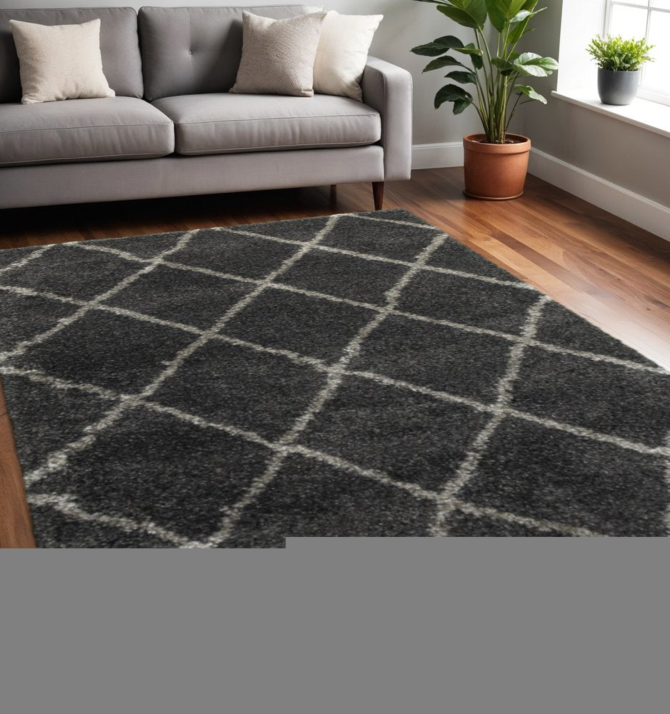 5' X 8' Charcoal And Grey Geometric Shag Power Loom Stain Resistant Area Rug
