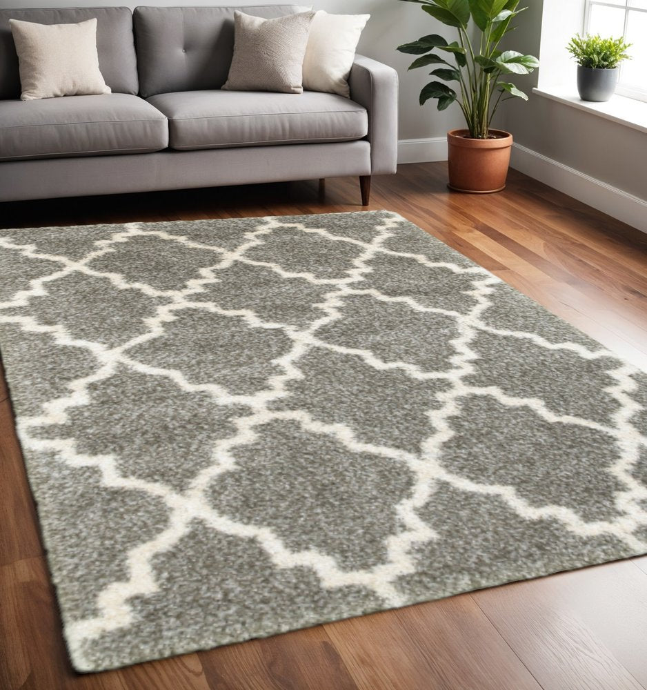 5' X 8' Grey And Ivory Geometric Shag Power Loom Stain Resistant Area Rug