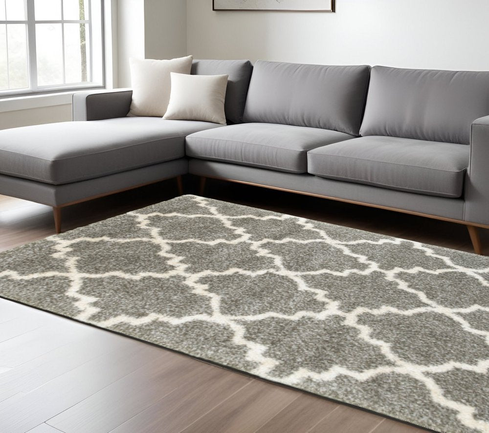 6' X 9' Grey And Ivory Geometric Shag Power Loom Stain Resistant Area Rug