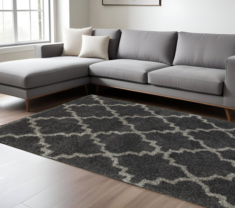 8' X 11' Charcoal And Grey Geometric Shag Power Loom Stain Resistant Area Rug