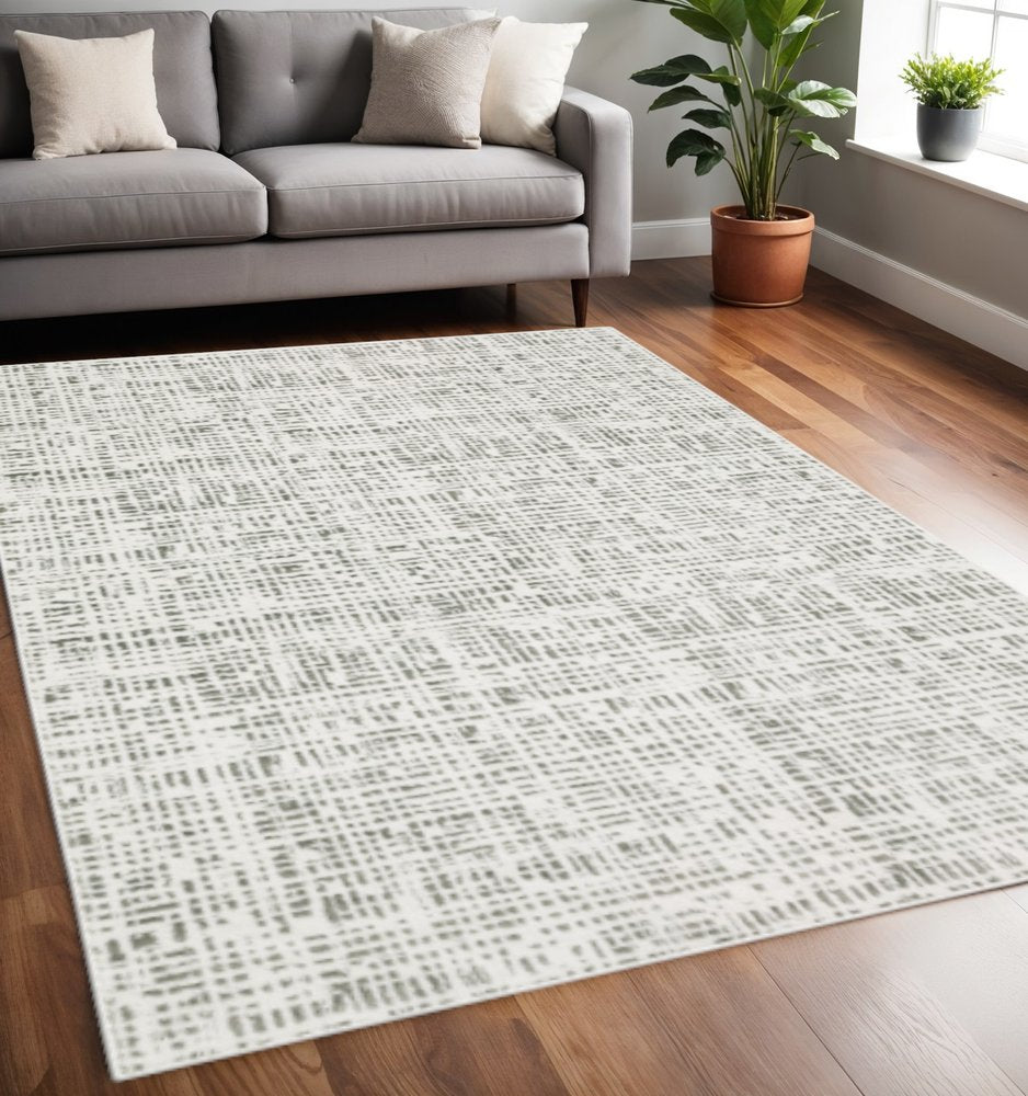 5' X 8' White And Grey Abstract Power Loom Stain Resistant Area Rug