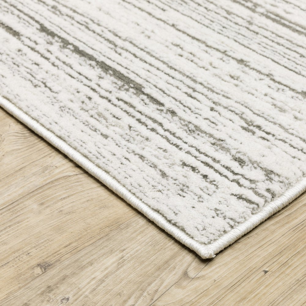 8' X 11' White And Gray Abstract Distressed Area Rug